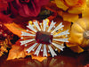 Vintage KJL Starburst Brooch: Red Emerald, Gold-Tone Christmas Jewelry