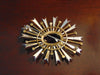 Vintage KJL Starburst Brooch: Red Emerald, Gold-Tone Christmas Jewelry