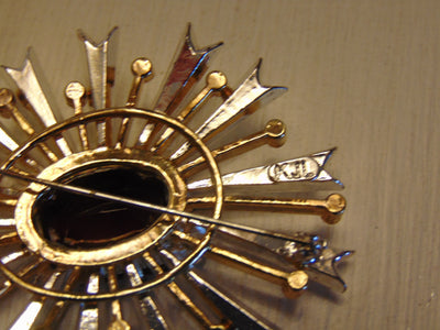 Vintage KJL Starburst Brooch: Red Emerald, Gold-Tone Christmas Jewelry