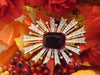 Vintage KJL Starburst Brooch: Red Emerald, Gold-Tone Christmas Jewelry