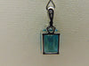 14KTWG Blue Topaz Necklace: Emerald Cut Diamond Accent
