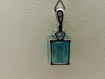 14KTWG Blue Topaz Necklace: Emerald Cut Diamond Accent