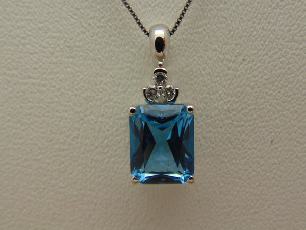 14KTWG Blue Topaz Necklace: Emerald Cut Diamond Accent