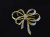 KJL Rhinestone Bow Brooch and Clip Earring Set - 1980s
