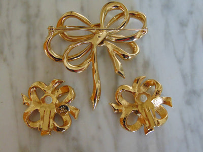 KJL Rhinestone Bow Brooch and Clip Earring Set - 1980s