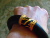 Elizabeth Taylor Zebra Stripe Bracelet: Rhinestone & Gold Accents
