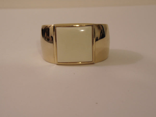 S.M.Kent 1977 Kent Collection Faux Ivory Center On This Gold Tone Cuff Bracelet