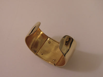 S.M.Kent 1977 Kent Collection Faux Ivory Center On This Gold Tone Cuff Bracelet