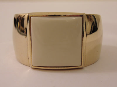 S.M.Kent 1977 Kent Collection Faux Ivory Center On This Gold Tone Cuff Bracelet