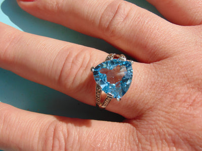 14KT White Gold Blue Topaz Ring with Champagne Diamonds