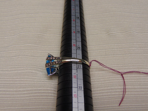 14KT White Gold Blue Topaz Ring with Champagne Diamonds