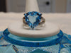 14KT White Gold Blue Topaz Ring with Champagne Diamonds