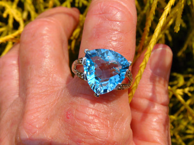 14KT White Gold Blue Topaz Ring with Champagne Diamonds