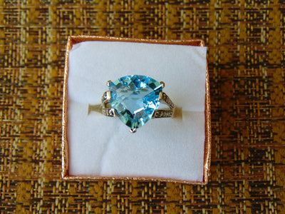 14KT White Gold Blue Topaz Ring with Champagne Diamonds