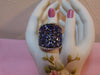 Sterling Silver Tanzanite Saddle Ring: CZ Accents, Size 7.75